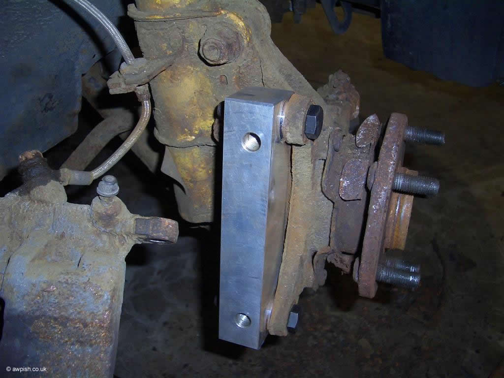 fitting of front caliper adaptor brackets